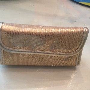 Gold makeup bag